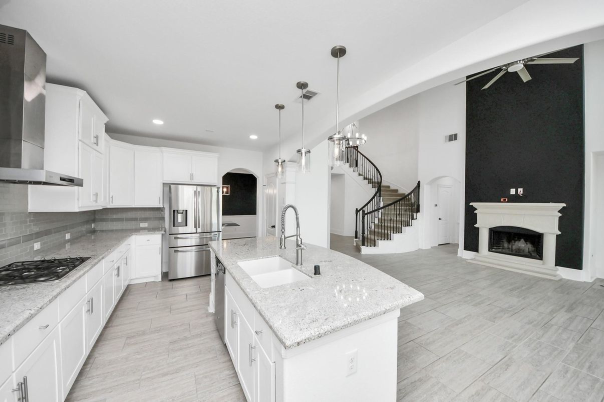 Fireplace, Interior, Kitchen, Pendant Lights, Recessed Lighting, Stainless Steel Appliances, Wood Texture Flooring