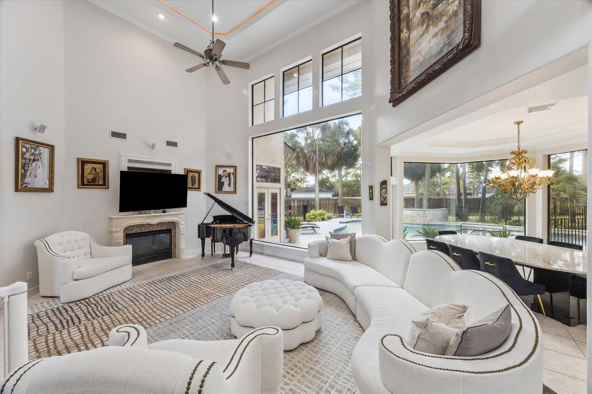 Chandelier, Fireplace, Interior, Living room, Piano, Recessed Lighting