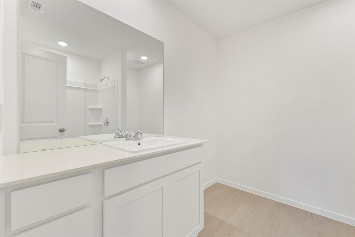 Bathroom, Dual Sink Vanities, Interior, Recessed Lighting, Wood Texture Flooring