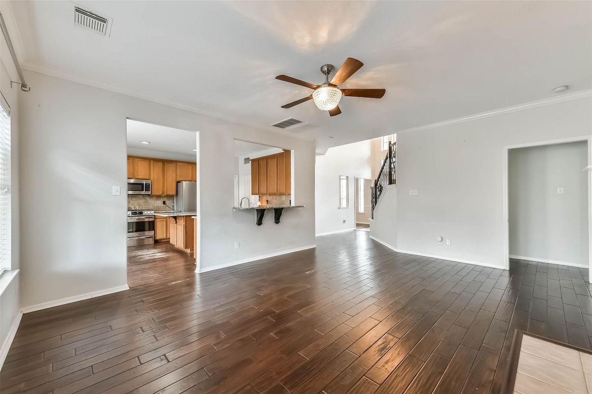 Empty room, Interior, Kitchen, Stainless Steel Appliances, Wood Texture Flooring