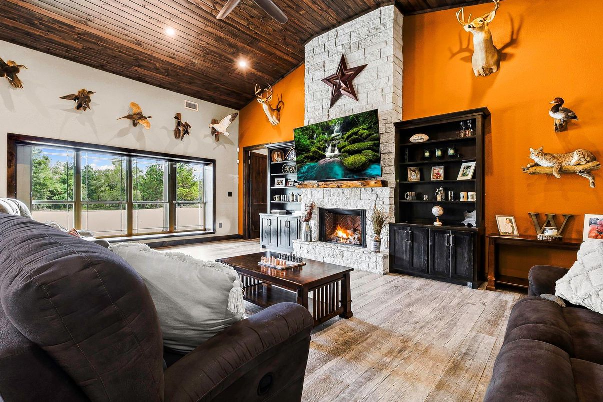 Fireplace, Interior, Living room, Recessed Lighting, Stone Walls, Wooden Ceilings