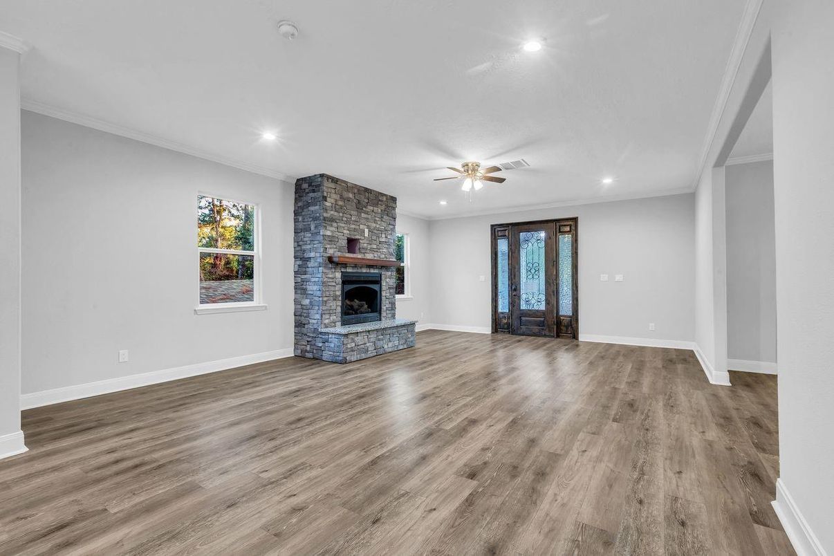 Empty room, Fireplace, Interior, Recessed Lighting, Stone Walls, Wood Texture Flooring