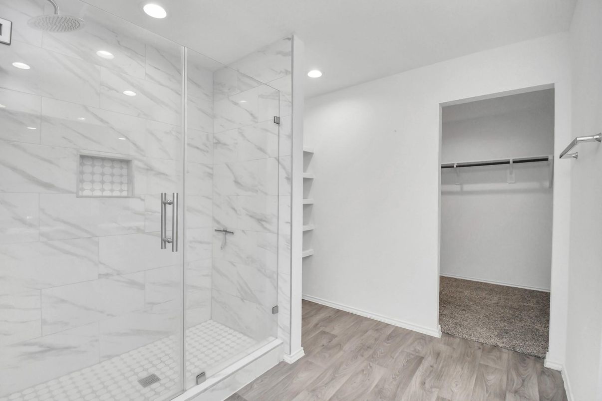 Bathroom, Glass Shower, Interior, Marble Walls, Recessed Lighting, Walk-in Closets, Wood Texture Flooring