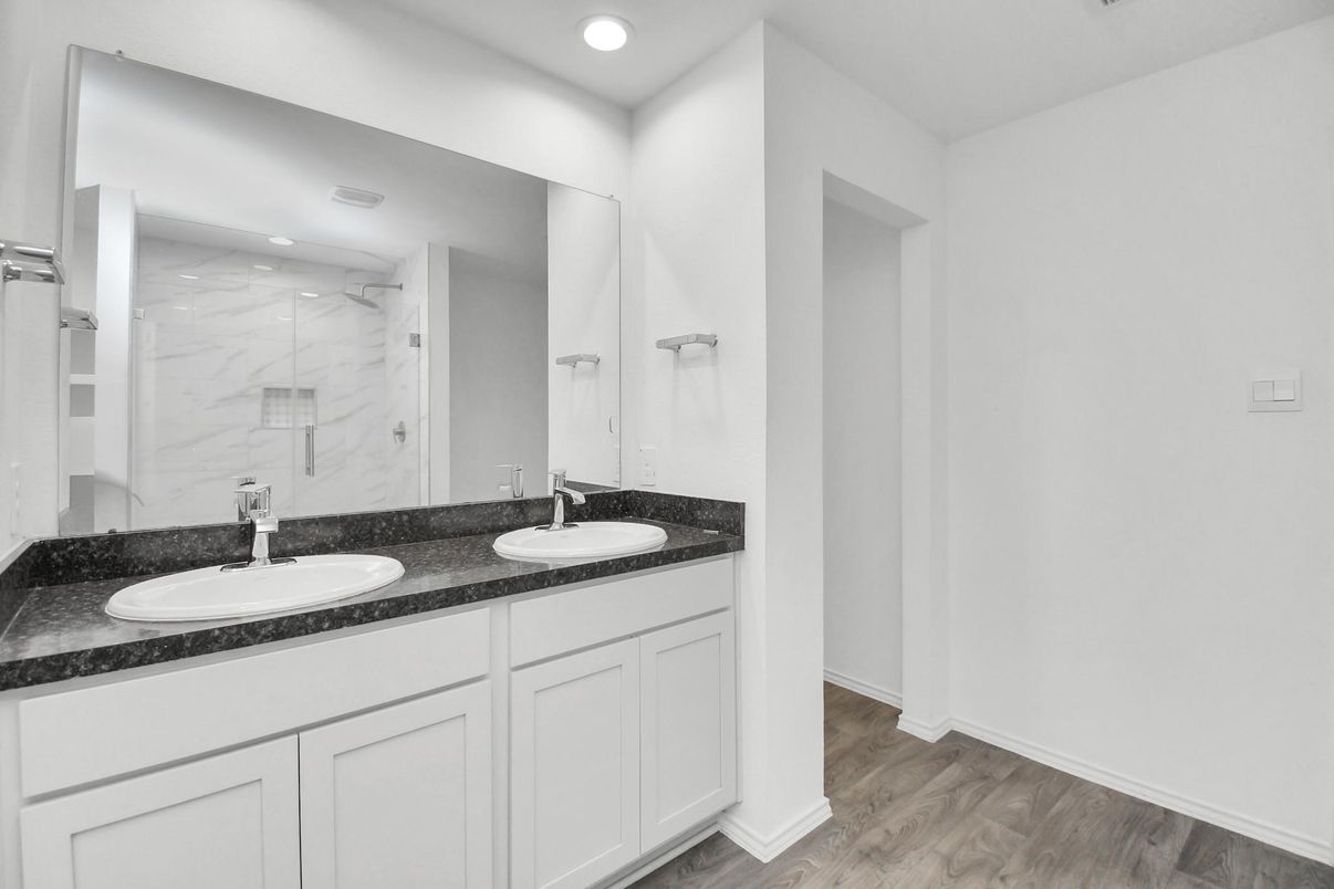 Bathroom, Dual Sink Vanities, Interior, Marble Walls, Recessed Lighting, Wood Texture Flooring