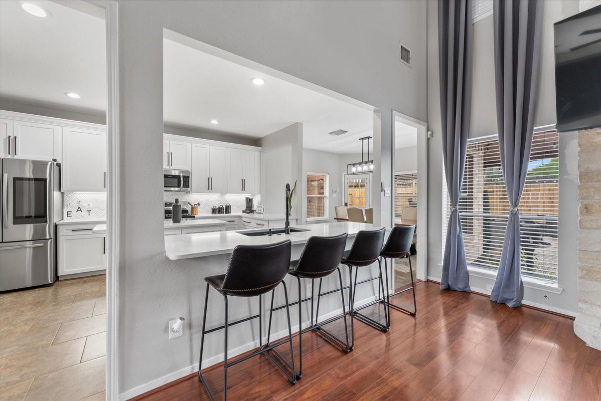 Interior, Kitchen, Pendant Lights, Recessed Lighting, Stainless Steel Appliances, Wood Texture Flooring