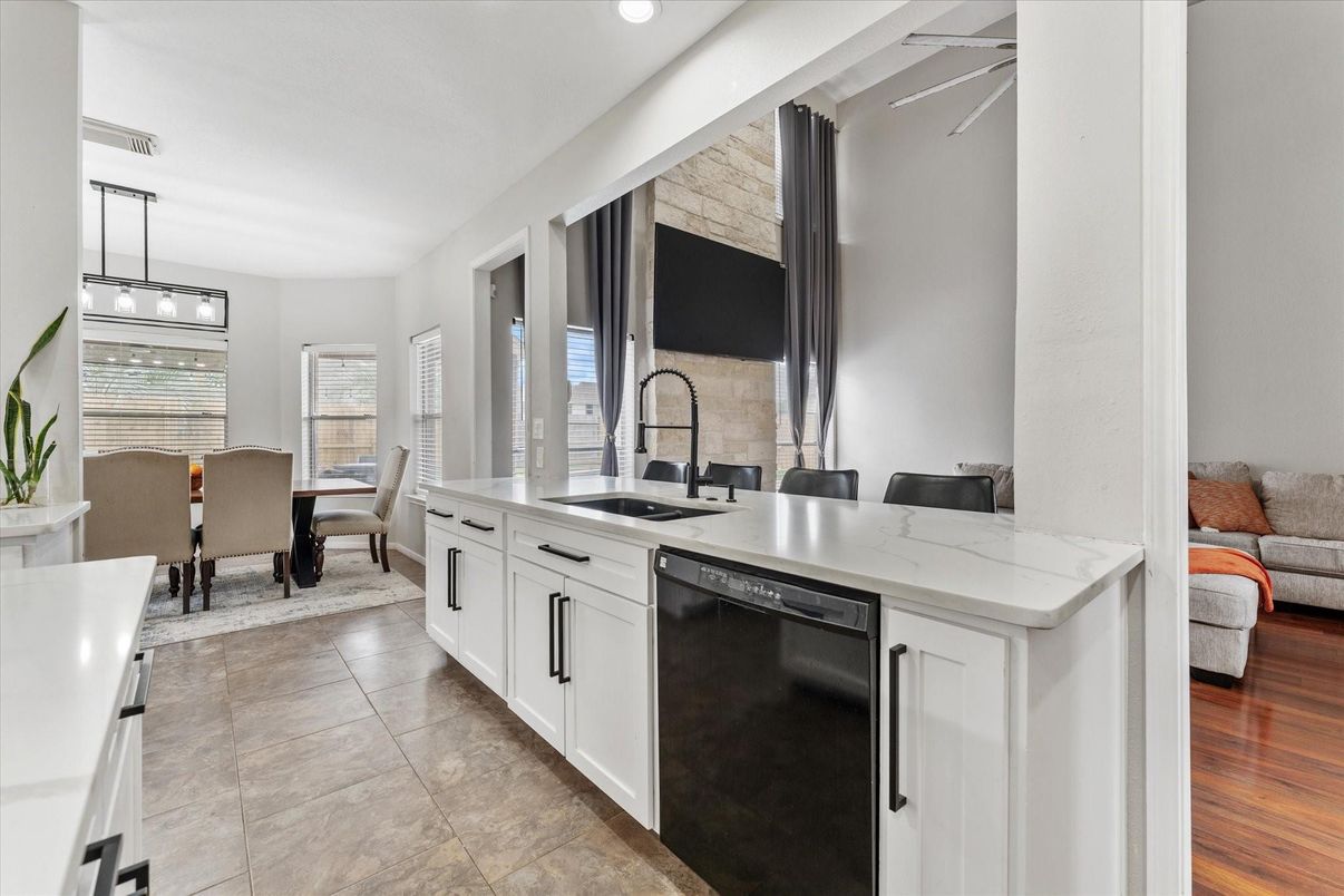 Dining room, Interior, Kitchen, Pendant Lights, Recessed Lighting, Stainless Steel Appliances, Wood Texture Flooring