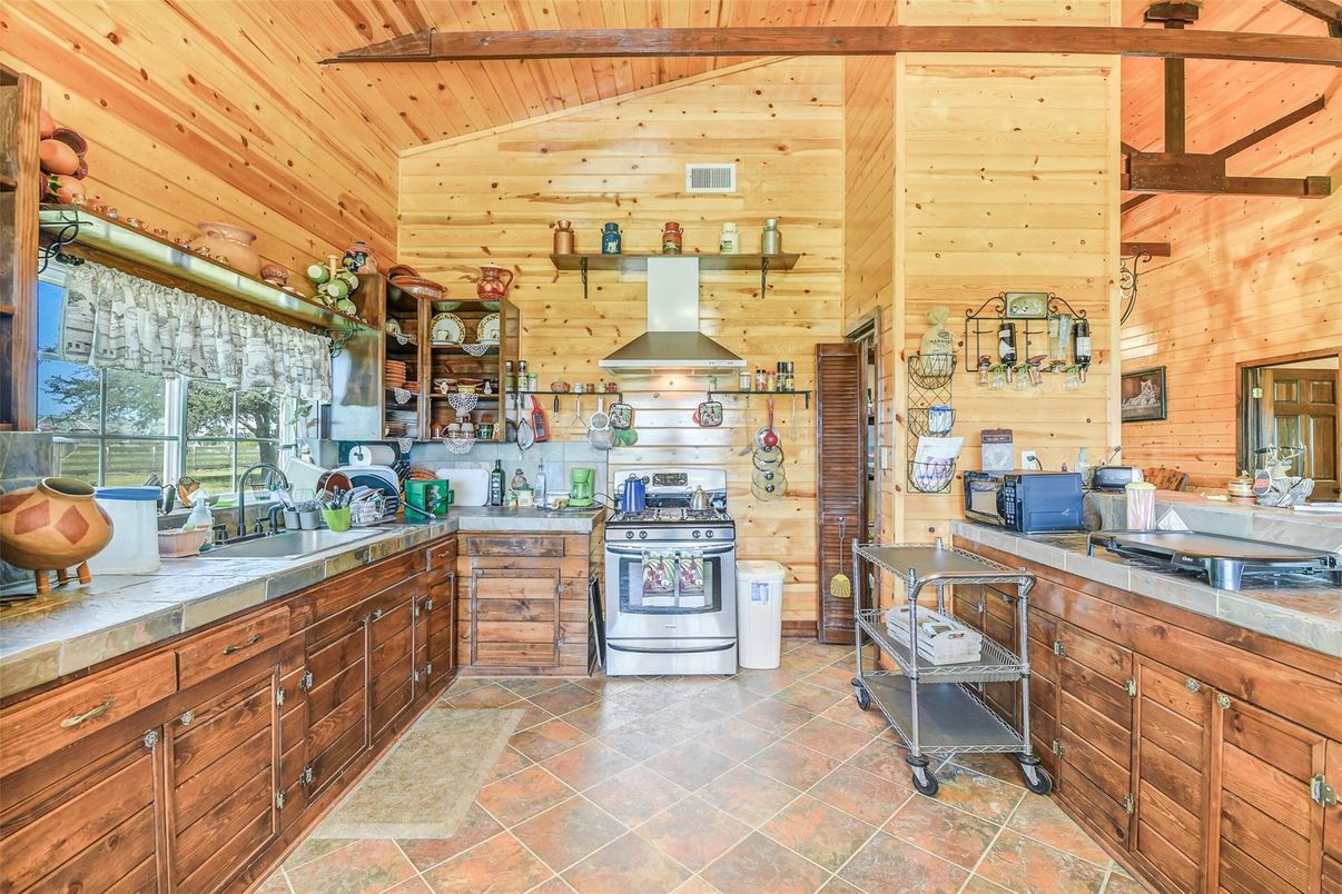 Interior, Kitchen, Tile Countertops, Wooden Ceilings, Wooden Walls