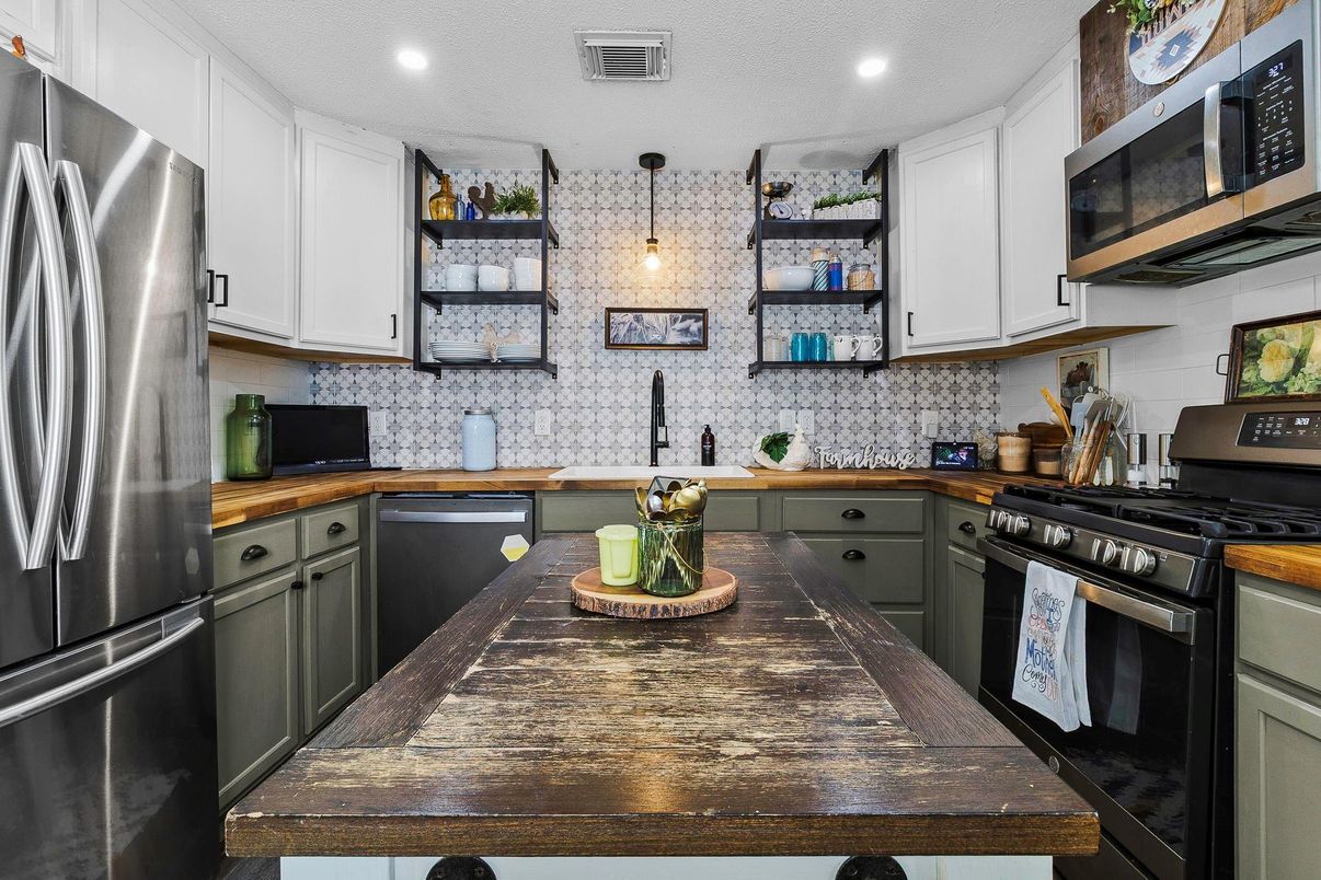 Interior, Kitchen, Pendant Lights, Recessed Lighting, Stainless Steel Appliances, Stone Walls