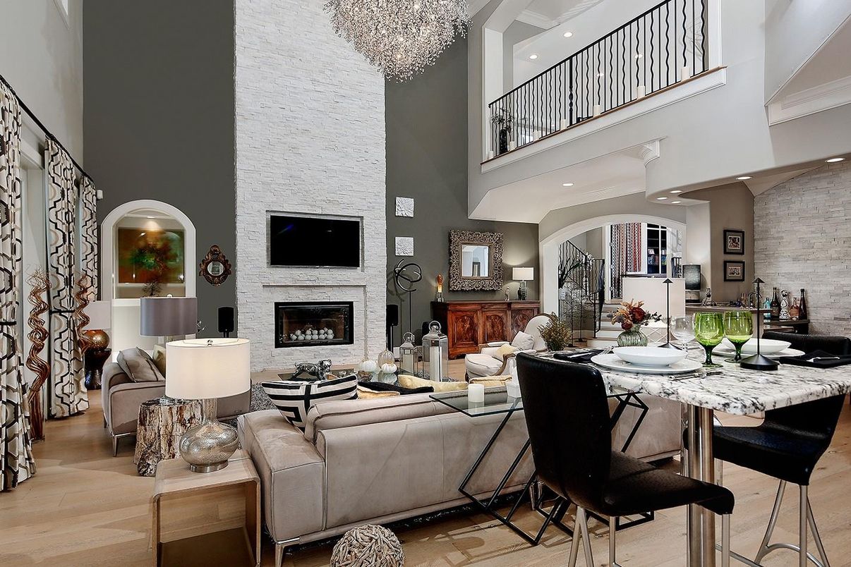 Chandelier, Dining room, Fireplace, Interior, Living room, Recessed Lighting, Stone Walls, Wood Texture Flooring