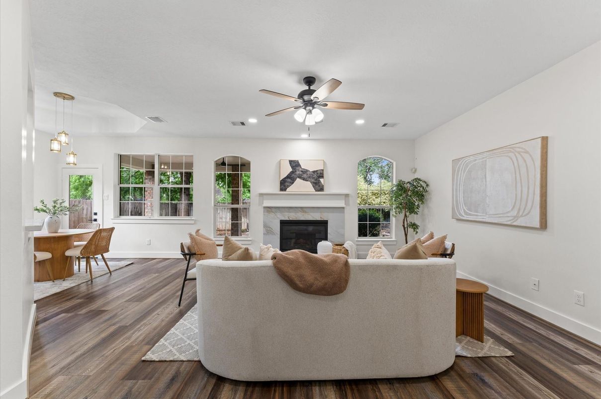 Dining room, Fireplace, Interior, Living room, Pendant Lights, Recessed Lighting, Wood Texture Flooring