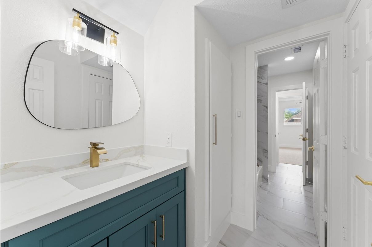 Bathroom, Dual Sink Vanities, Interior, Marble, Recessed Lighting, Wood Texture Flooring