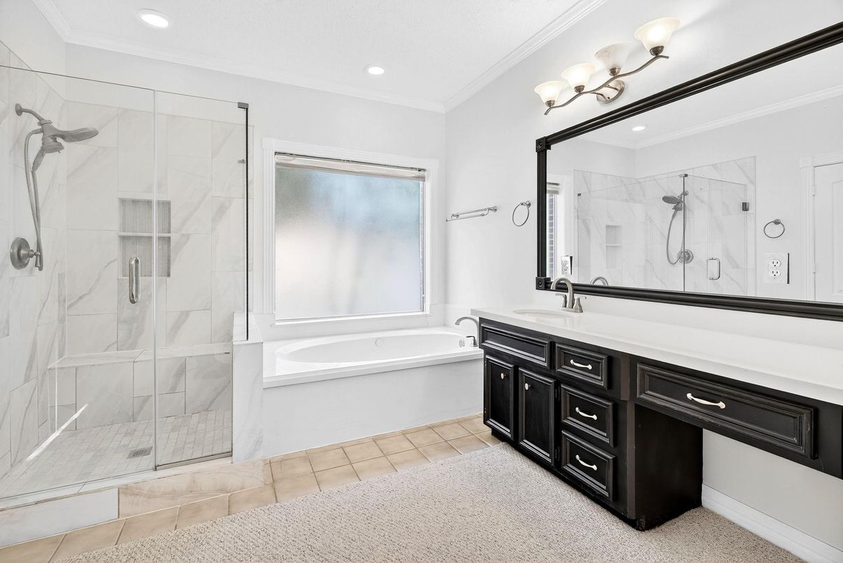 Bathroom, Dual Sink Vanities, Glass Shower, Interior, Marble Walls, Recessed Lighting