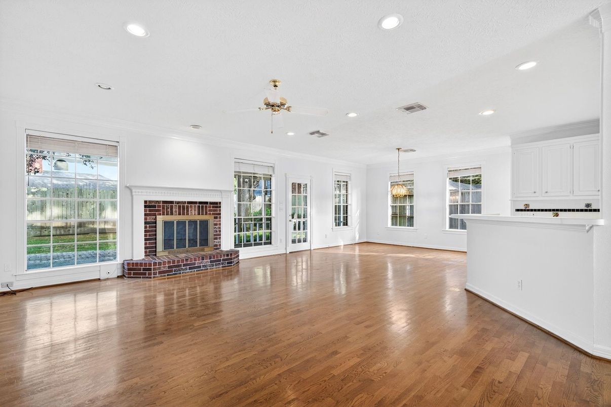 Empty room, Fireplace, Interior, Recessed Lighting, Wood Texture Flooring