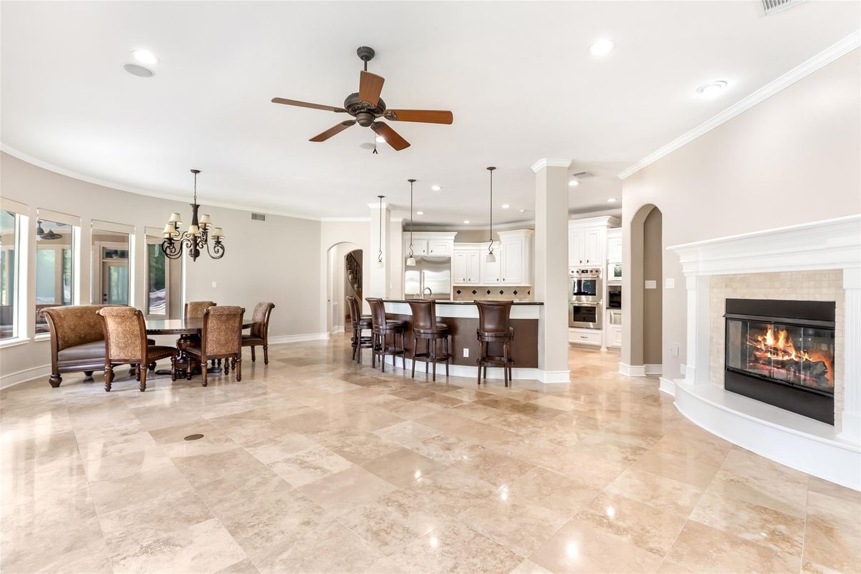 Chandelier, Dining room, Fireplace, Interior, Kitchen, Pendant Lights, Recessed Lighting, Stainless Steel Appliances