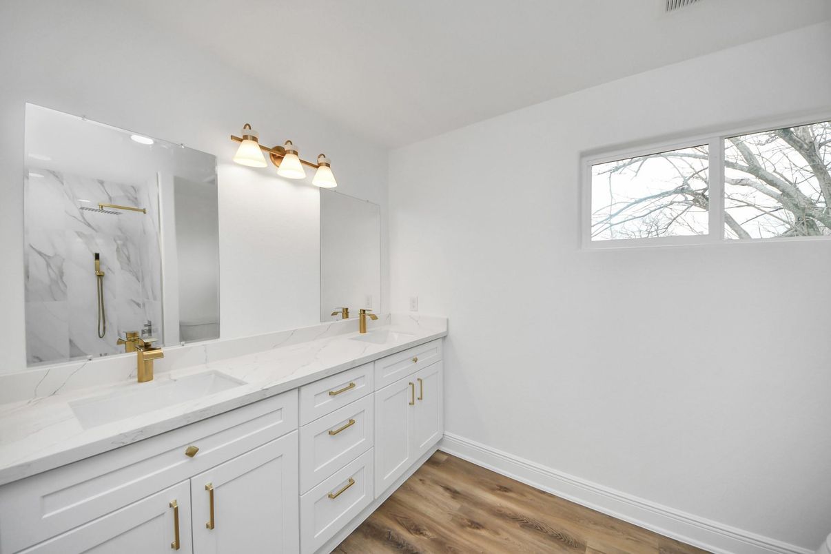 Bathroom, Dual Sink Vanities, Interior, Marble Walls, Wood Texture Flooring