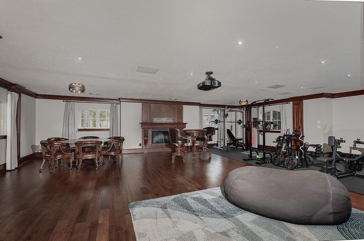 Dining room, Fireplace, Fitness Equipment, Interior, Recessed Lighting, Wood Texture Flooring