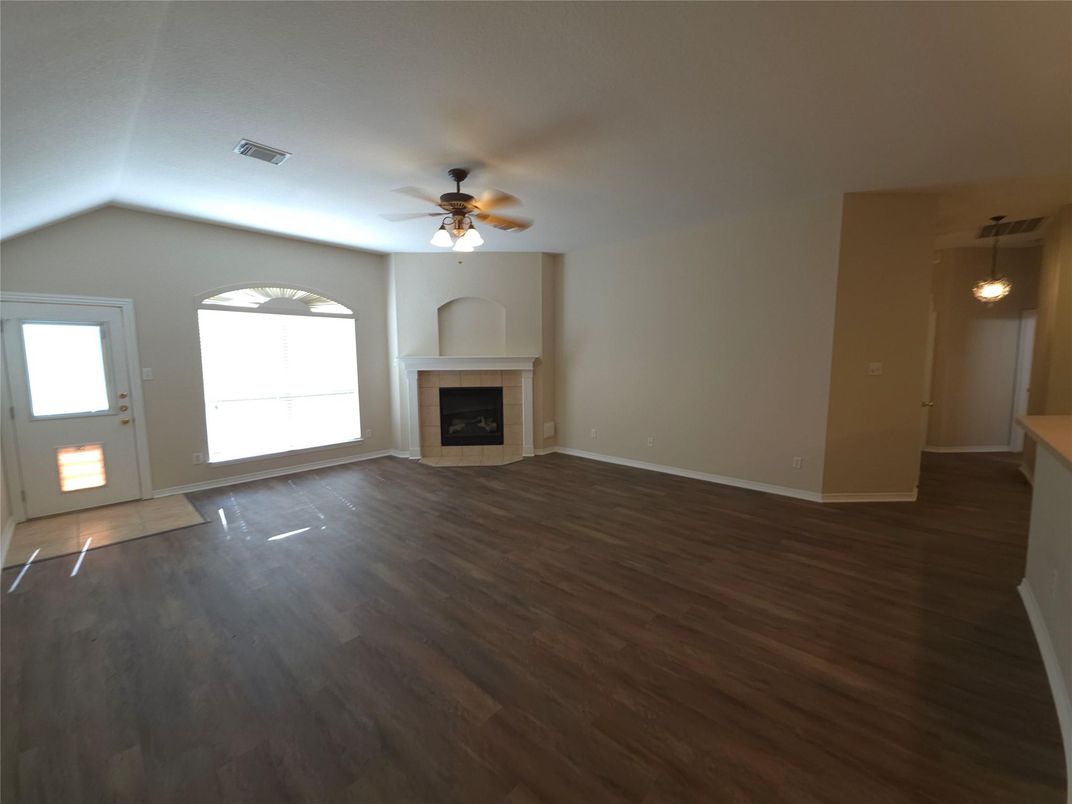 Empty room, Fireplace, Interior, Pendant Lights, Wood Texture Flooring