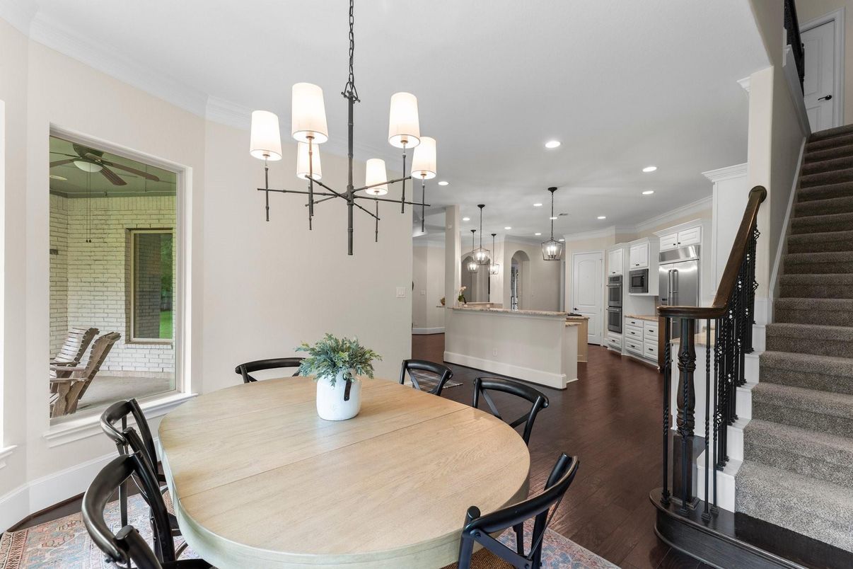 Dining room, Interior, Kitchen, Pendant Lights, Recessed Lighting, Stainless Steel Appliances, Wood Texture Flooring