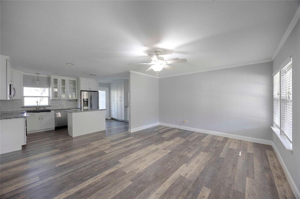 Empty room, Interior, Kitchen, Stainless Steel Appliances, Wood Texture Flooring