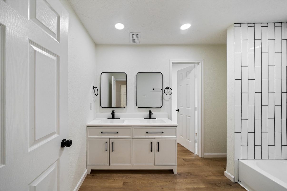 Bathroom, Dual Sink Vanities, Interior, Recessed Lighting, Wood Texture Flooring