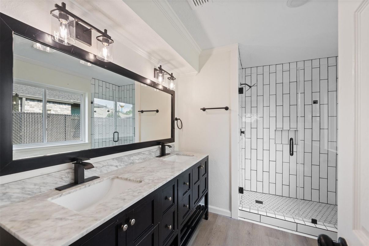 Bathroom, Dual Sink Vanities, Glass Shower, Interior, Wood Texture Flooring
