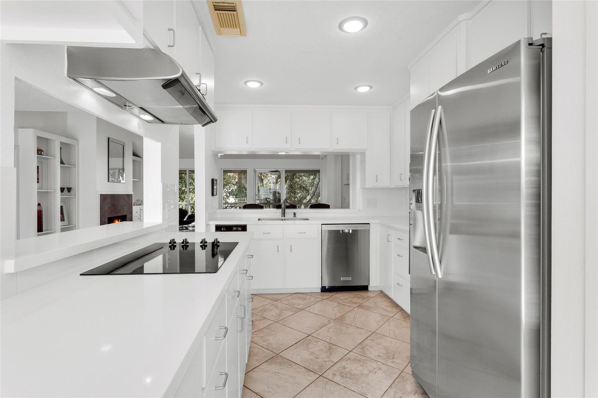 Fireplace, Interior, Kitchen, Recessed Lighting, Stainless Steel Appliances