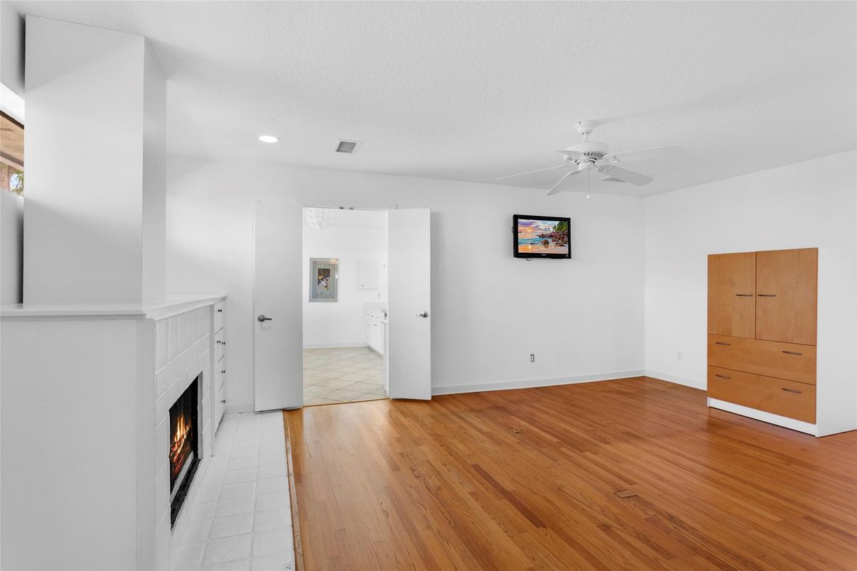Empty room, Fireplace, Interior, Recessed Lighting, Wood Texture Flooring
