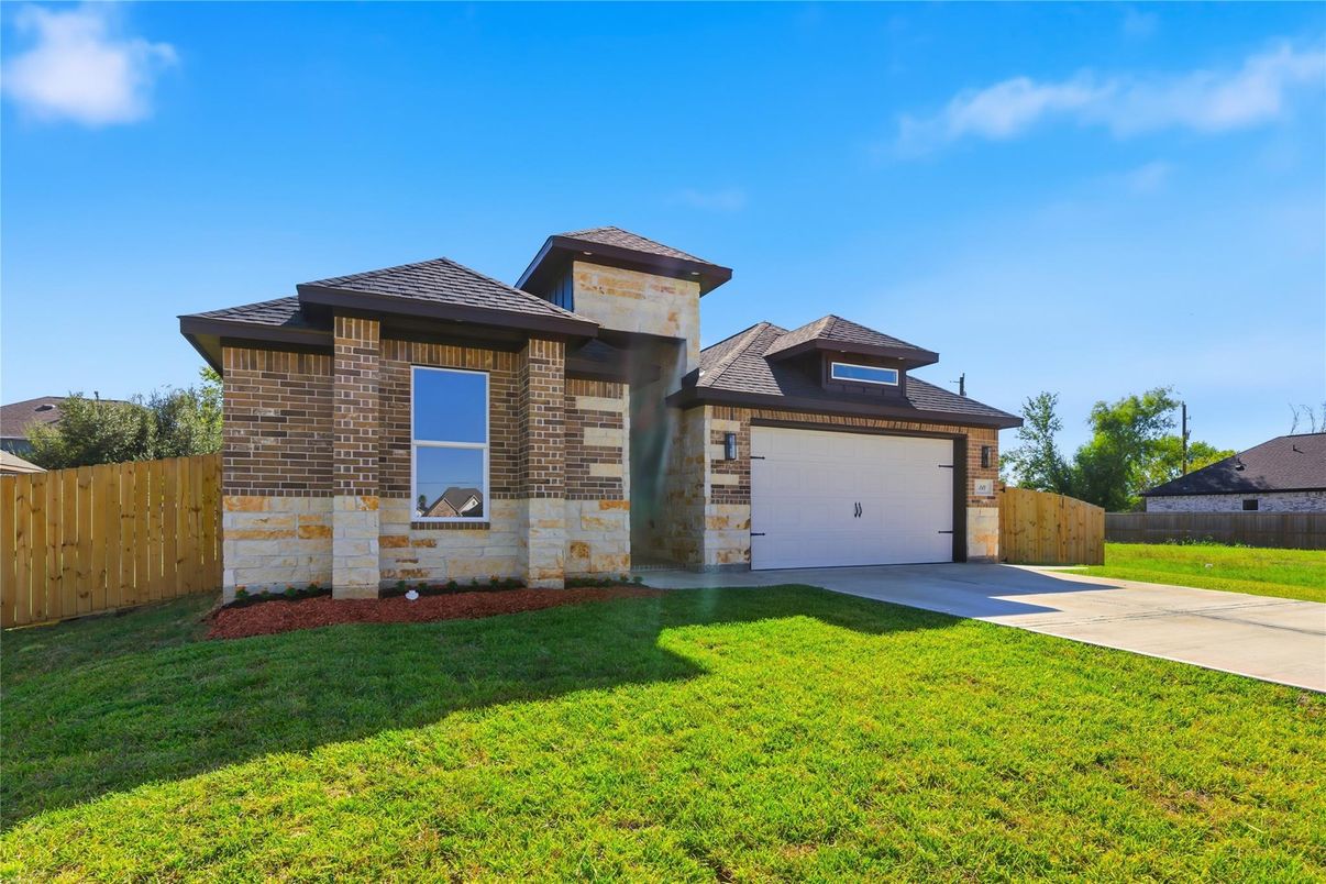 Attached, Backyard, Exterior, Facade, Brick Facade, Mediterranean