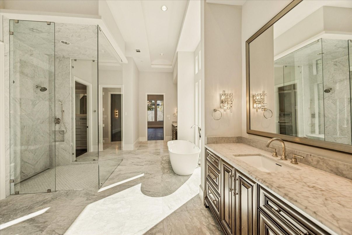 Bathroom, Dual Sink Vanities, Free Standing Baths, Glass Shower, Interior, Marble, Marble Walls, Recessed Lighting