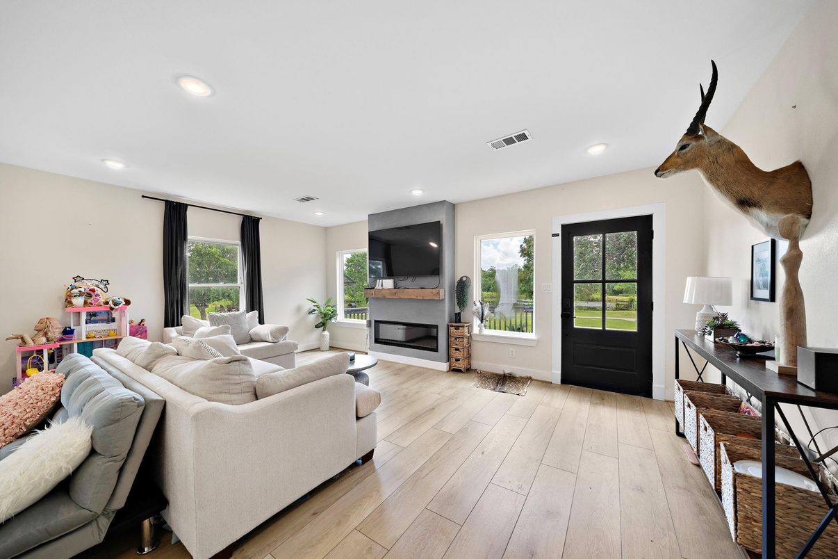 Fireplace, Interior, Living room, Recessed Lighting, Wood Texture Flooring