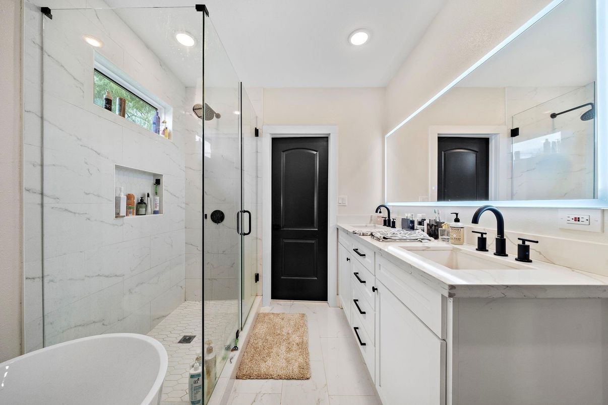 Bathroom, Dual Sink Vanities, Glass Shower, Interior, Marble Walls, Recessed Lighting