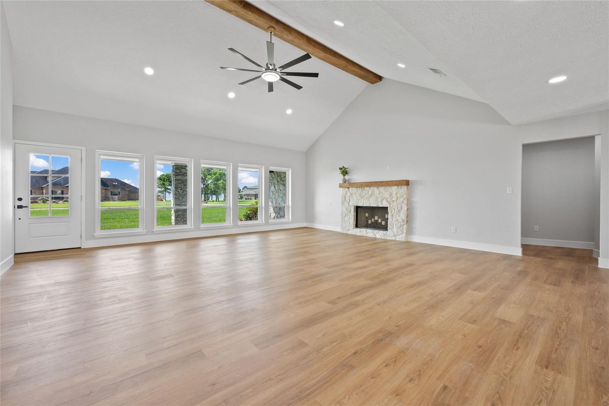 Empty room, Fireplace, Interior, Recessed Lighting, Wooden Beams, Wood Texture Flooring