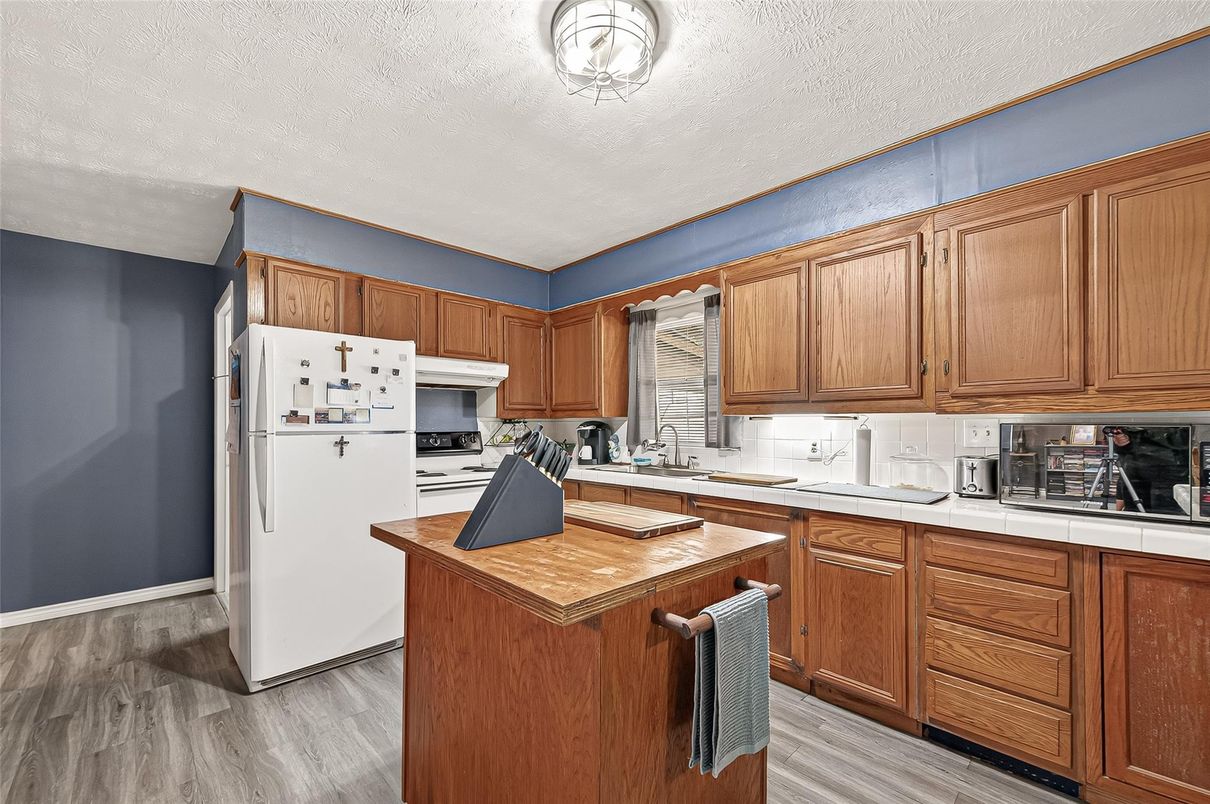 Interior, Kitchen, Tile Countertops, Wood Texture Flooring