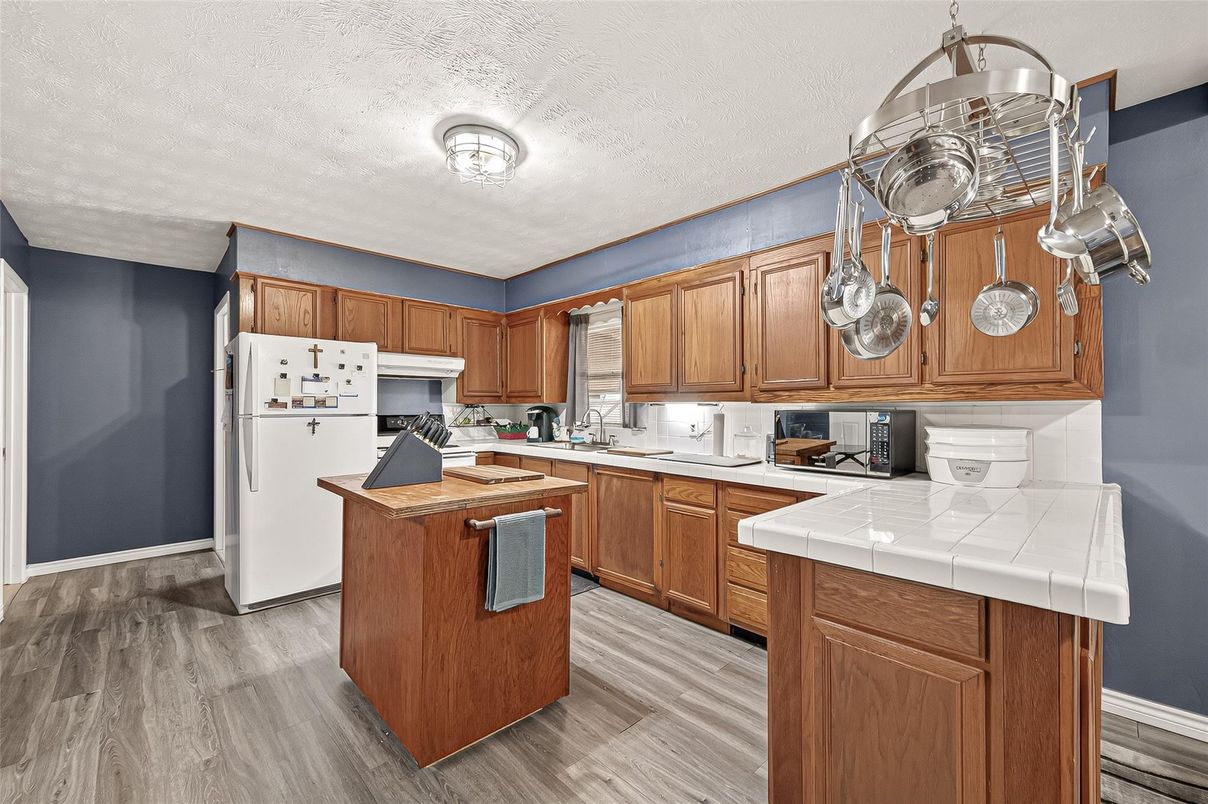 Interior, Kitchen, Tile Countertops, Wood Texture Flooring