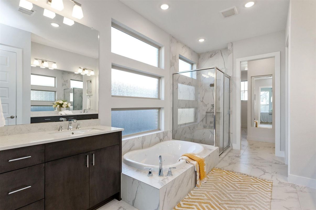 Bathroom, Dual Sink Vanities, Glass Shower, Interior, Marble, Marble Walls, Recessed Lighting