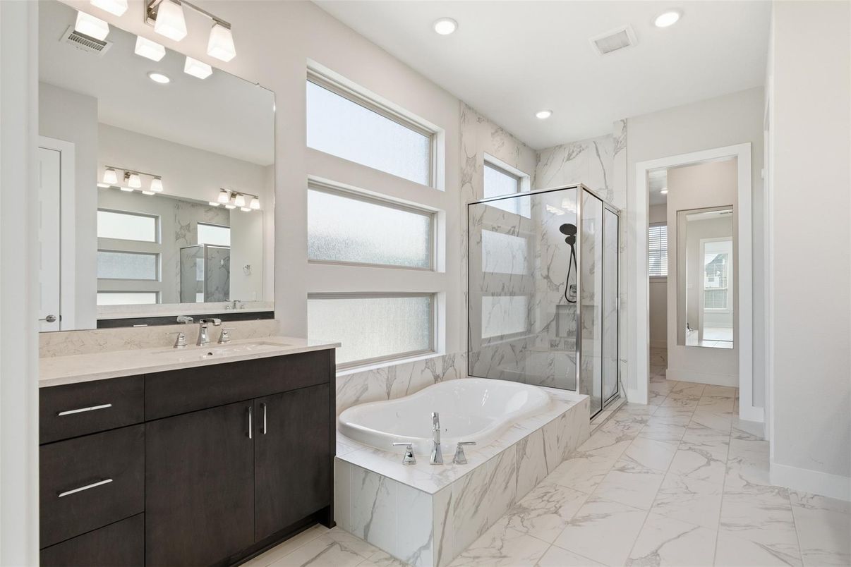 Bathroom, Dual Sink Vanities, Glass Shower, Interior, Marble, Marble Walls, Recessed Lighting