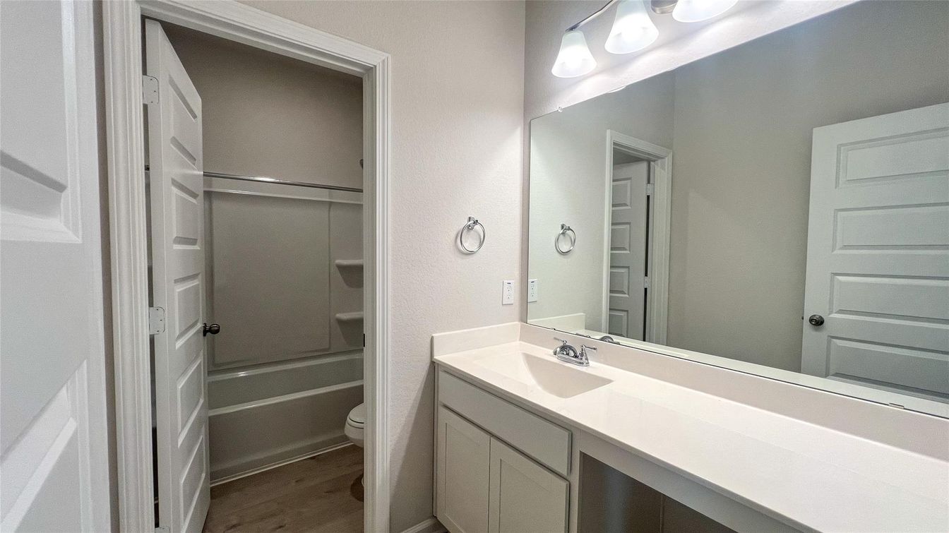 Bathroom, Dual Sink Vanities, Glass Shower, Interior, Wood Texture Flooring