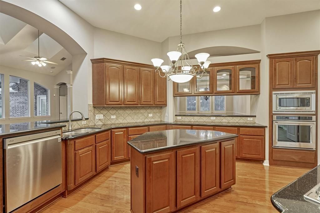 Chandelier, Interior, Kitchen, Pendant Lights, Recessed Lighting, Stainless Steel Appliances, Wood Texture Flooring