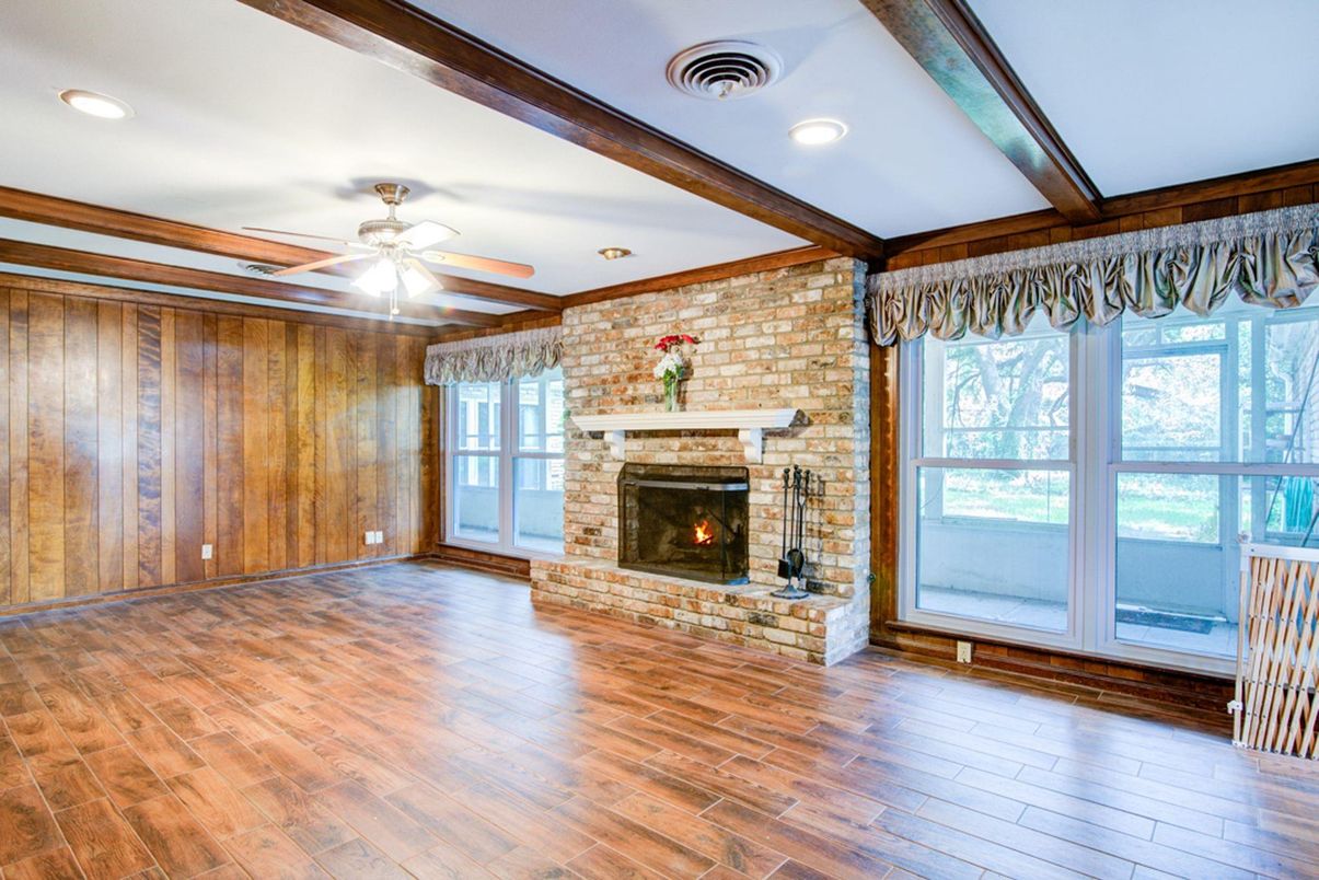 Empty room, Fireplace, Interior, Recessed Lighting, Stone Walls, Wood Texture Flooring