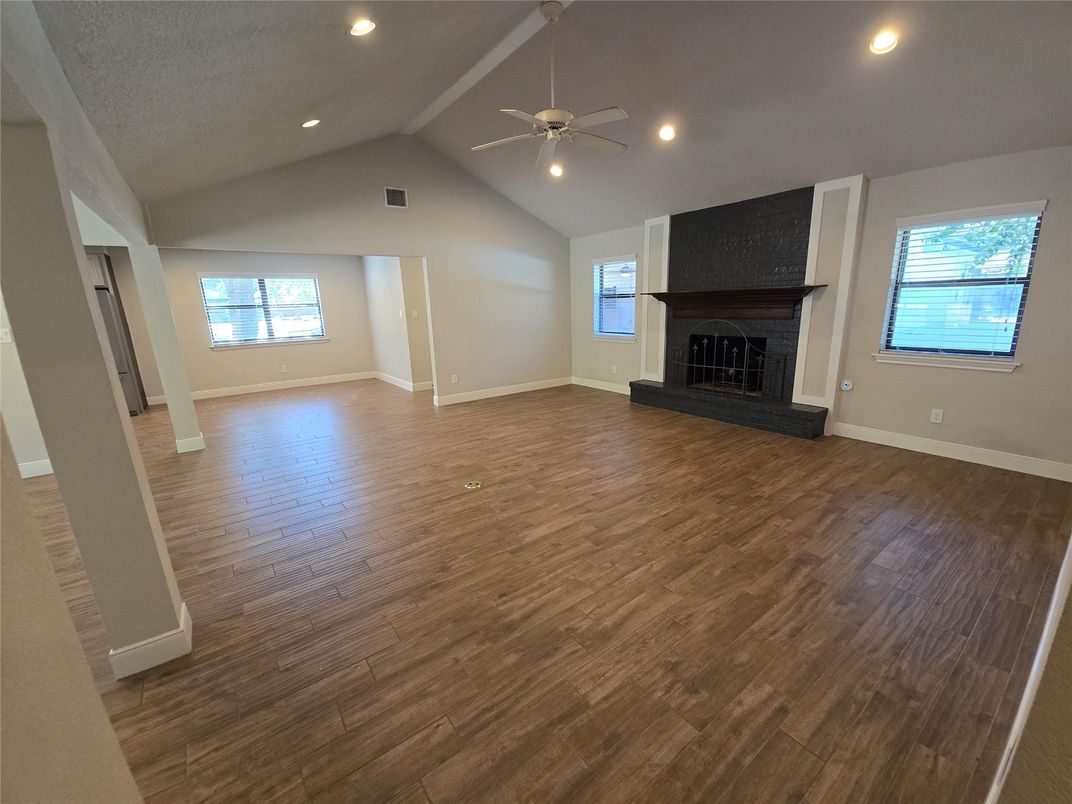 Empty room, Fireplace, Interior, Recessed Lighting, Wood Texture Flooring