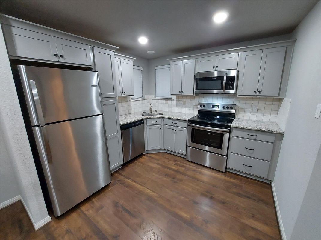 Interior, Kitchen, Recessed Lighting, Stainless Steel Appliances, Wood Texture Flooring