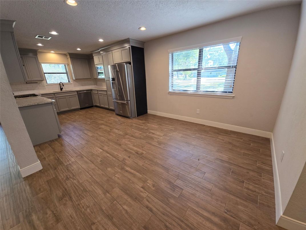 Interior, Kitchen, Recessed Lighting, Stainless Steel Appliances, Wood Texture Flooring