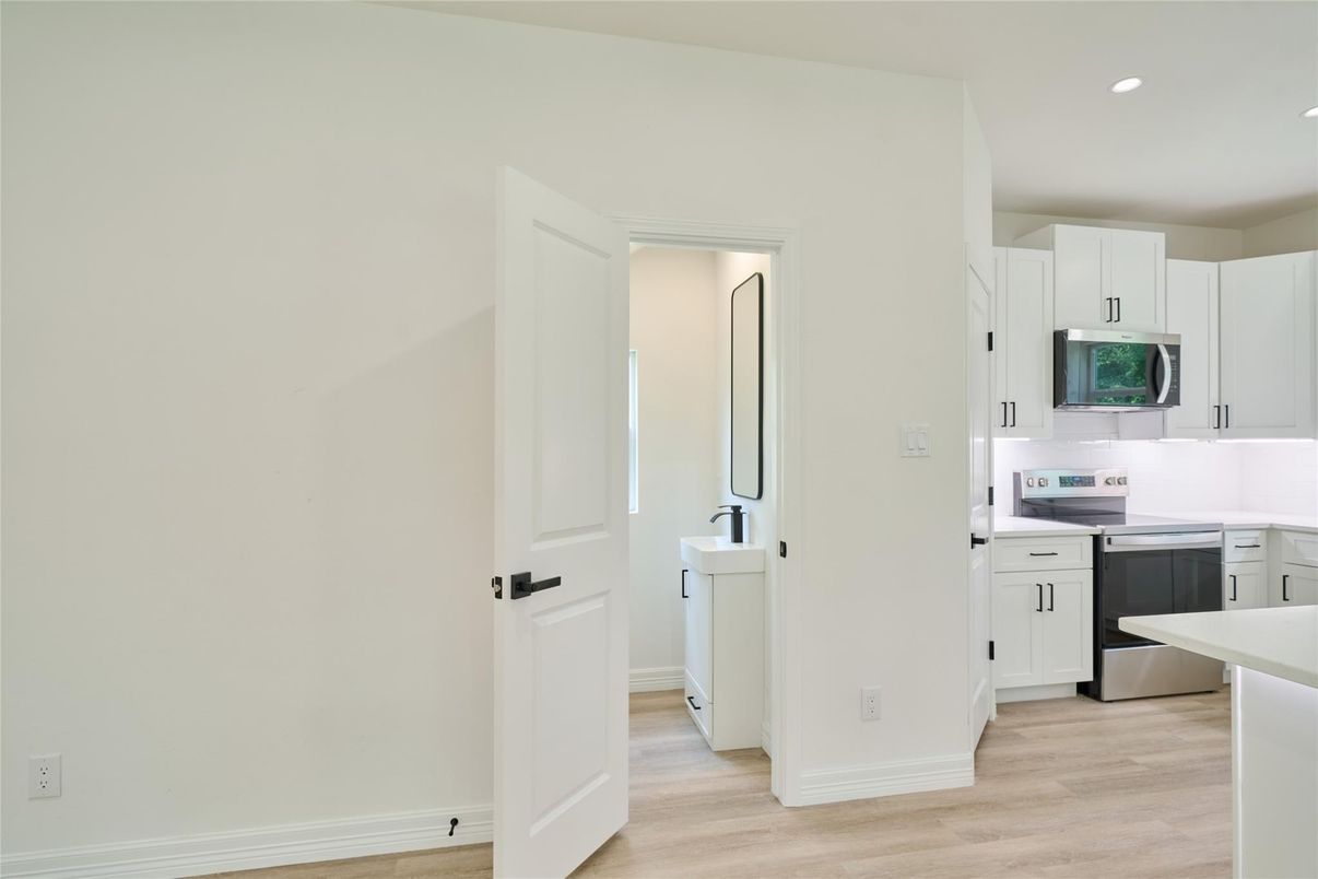 Interior, Kitchen, Recessed Lighting, Stainless Steel Appliances, Wood Texture Flooring