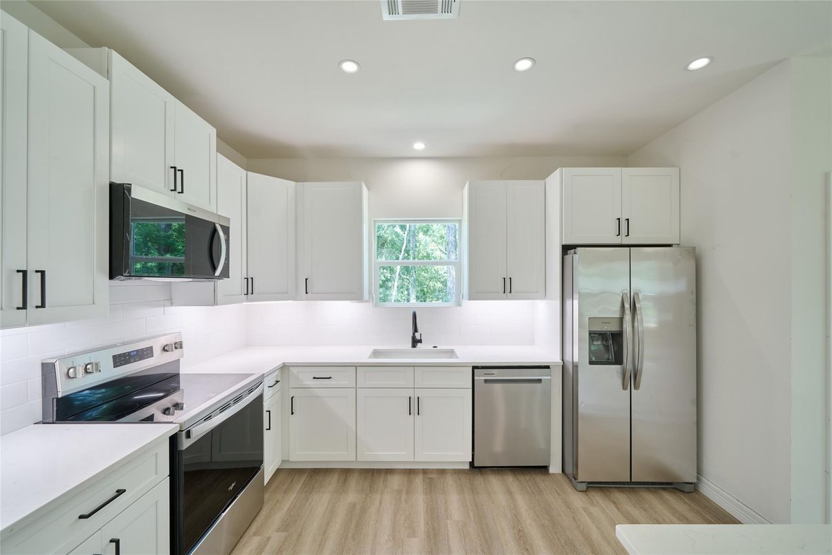Interior, Kitchen, Recessed Lighting, Stainless Steel Appliances, Wood Texture Flooring
