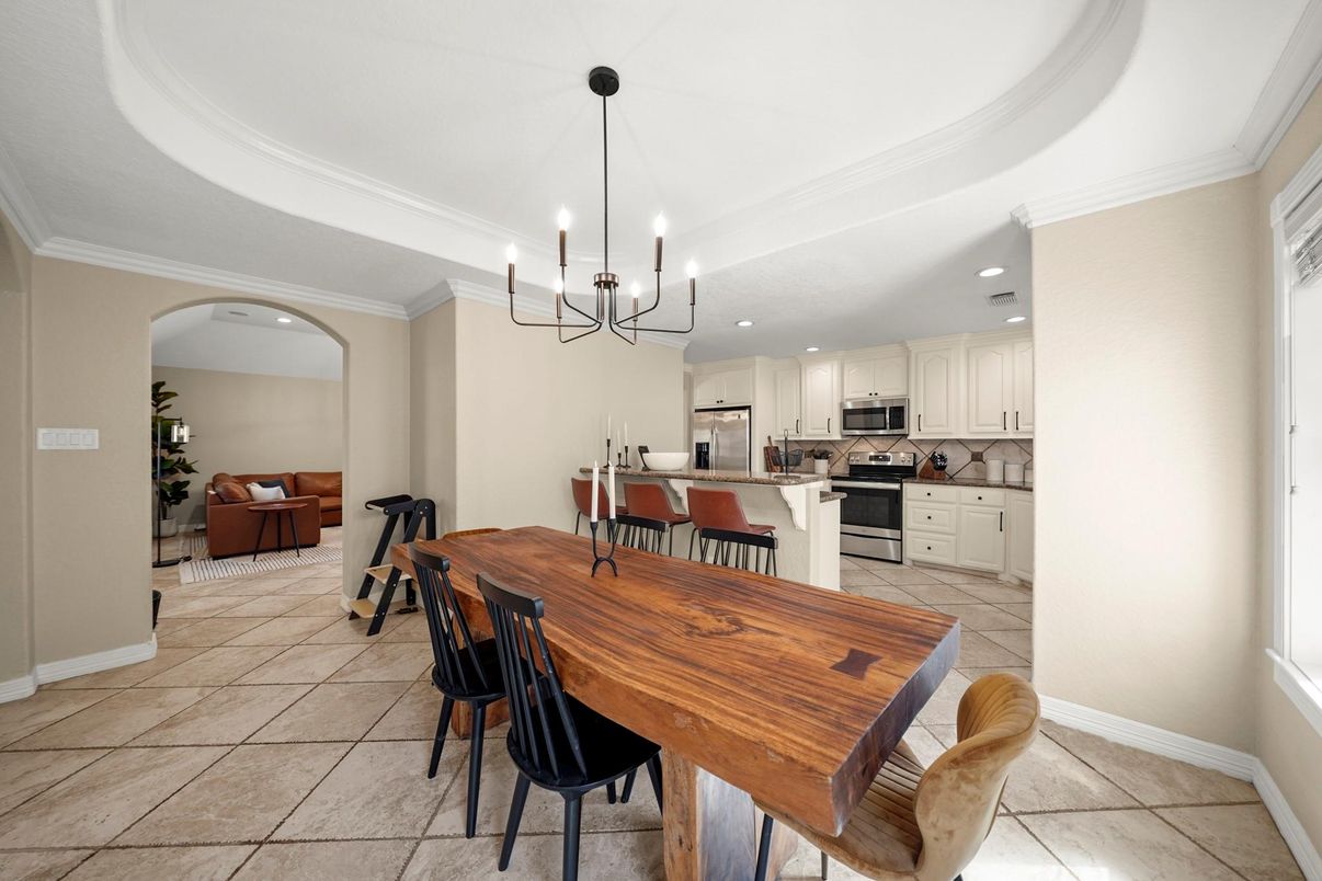 Chandelier, Dining room, Interior, Kitchen, Living room, Pendant Lights, Recessed Lighting, Stainless Steel Appliances