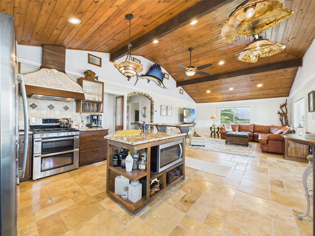 Chandelier, Interior, Kitchen, Living room, Pendant Lights, Recessed Lighting, Stainless Steel Appliances, Wooden Beams, Wooden Ceilings