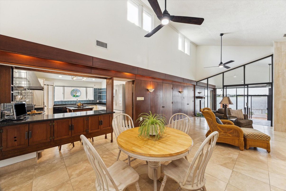 Dining room, Interior, Kitchen, Living room, Pendant Lights, Recessed Lighting, Water, Wooden Walls