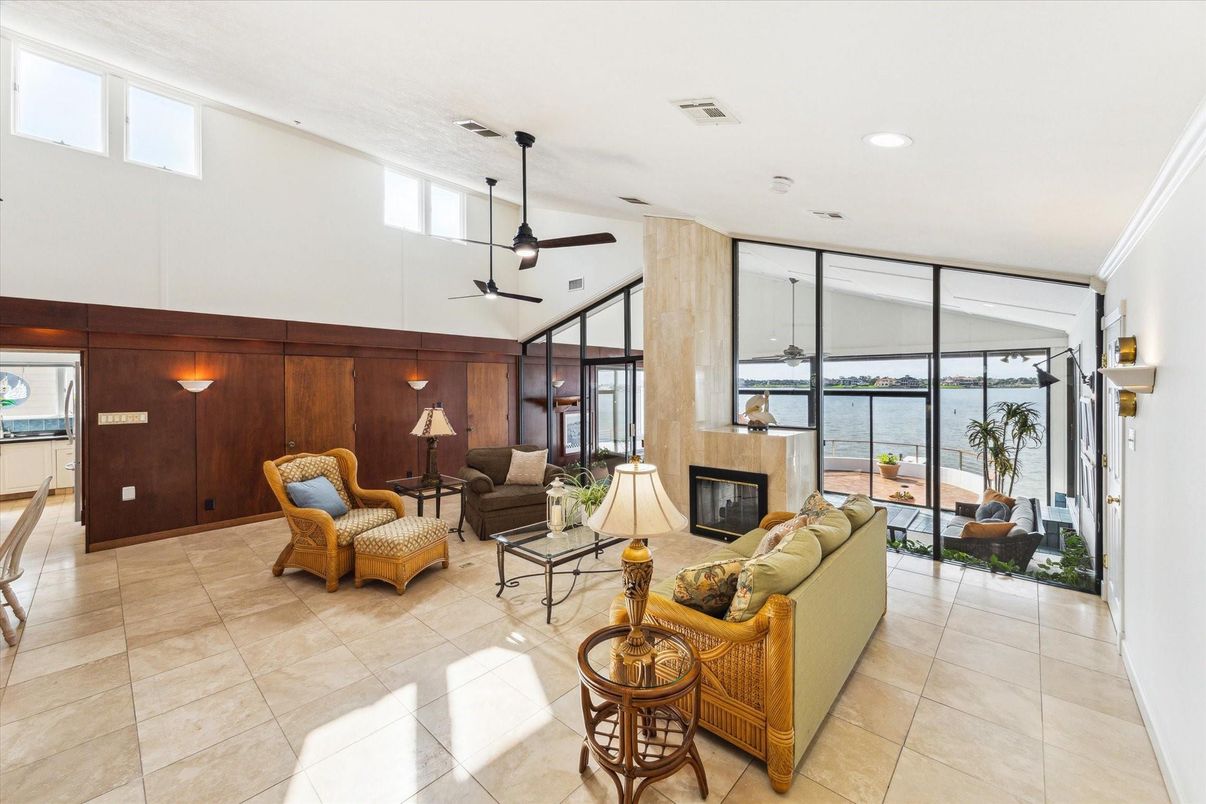 Fireplace, Interior, Living room, Recessed Lighting, Water, Wooden Walls