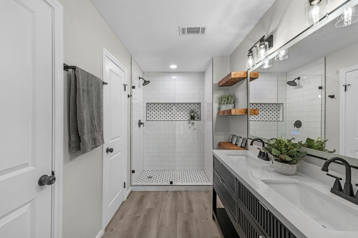 Bathroom, Dual Sink Vanities, Glass Shower, Interior, Recessed Lighting, Wood Texture Flooring