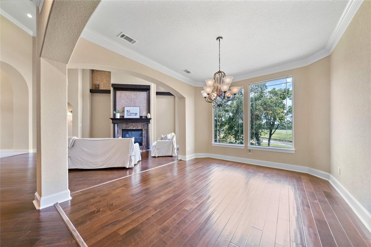 Chandelier, Empty room, Fireplace, Interior, Recessed Lighting, Wood Texture Flooring
